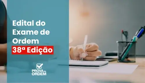 Edital OAB 38 - Estudante fazendo a leitura do edital impresso sobre a mesa de estudo